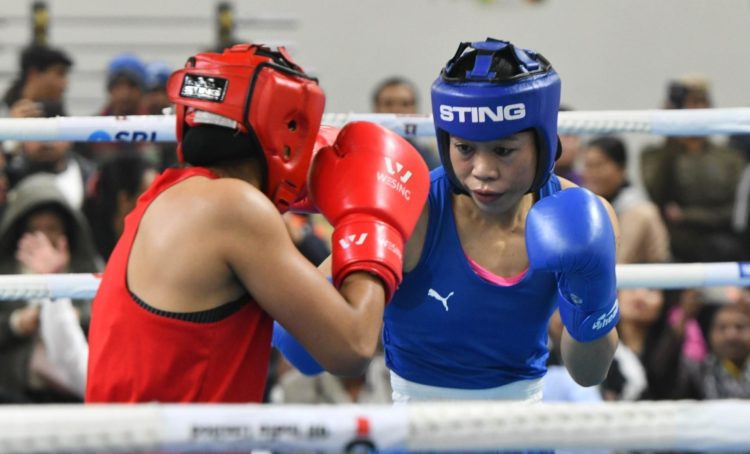 New Delhi: MC Mary Kom in action against Nikhat Zareen in the 51kg category at the Women's boxing trials for Olympics 2020 qualifiers in New Delhi, on Dec 28, 2019. (Photo: IANS)