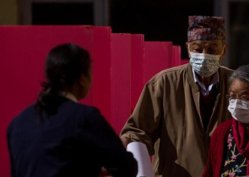 Voters cast ballots during the general elections in Kathmandu, Nepal, Nov. 20, 2022.(Photo by Sulav Shrestha/Xinhua/IANS)