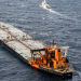 MT New Diamond oil tanker in the seas off Sri Lanka's eastern coast. The Sri Lanka Navy on Wednesday said a fire which had reignited onboard the MT New Diamond oil tanker on Monday has been brought under control and the distressed ship was being towed further away towards safe waters by a tug boat.