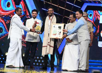 Union Minister Anurag Thakur and MoS L. Murugan felicitate Bollywood actor Ajay Devgn during the inaugural ceremony of 53rd International Film Festival of India at Dr Shyama Prasad Mukherjee Stadium in Goa on Sunday