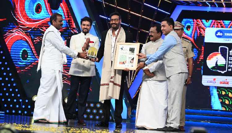 Union Minister Anurag Thakur and MoS L. Murugan felicitate Bollywood actor Ajay Devgn during the inaugural ceremony of 53rd International Film Festival of India at Dr Shyama Prasad Mukherjee Stadium in Goa on Sunday