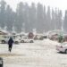 Gulmarg: Tourists seen during the fresh snowfall in Gulmarg on Thursday, Dec. 29, 2022.  (Photo: Nisar Malik /IANS)