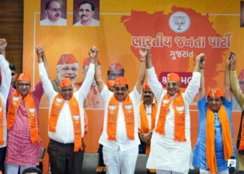 ujarat Chief Minister Bhupendra Patel and BJP state president CR Patil with party members celebrate the party's victory in Gujarat assembly elections, at party headquarters in Gandhinagar on Thursday, Dec. 08, 2022.