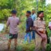 Villagers and Forest officials at the site where the carcass of elephant calf was found in Ganjam.