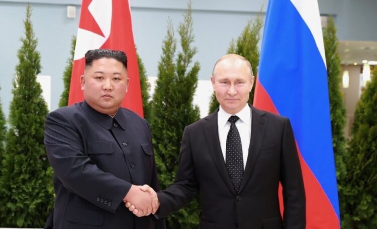 This file photo, carried by North Korea's official Korean Central News Agency, shows North Korean leader Kim Jong-un (L) and Russian President Vladimir Putin shaking hands for a summit in Vladivostok on April 26, 2019.(Yonhap/IANS)
