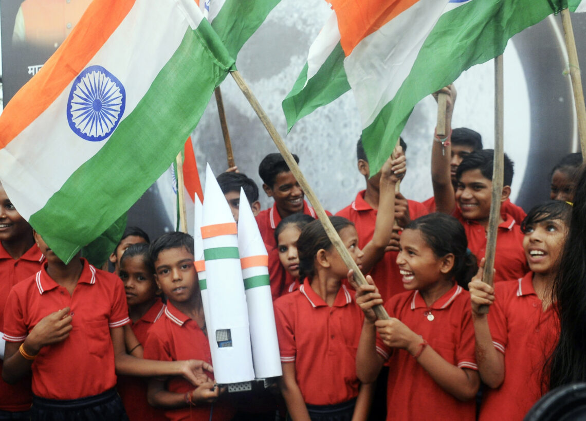 New Delhi : Children celebrate after the successful soft landing of ISRO's Chandrayaan-3 on the moon's surface, in New Delhi on Wednesday, August 23, 2023. (Photo: IANS/Qamar Sibtain)