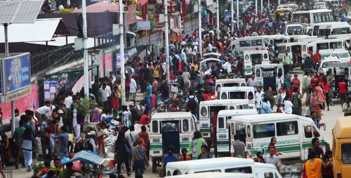 (160712) -- KATHMANDU, July 12, 2016 (Xinhua) -- A large number of people are seen at a bus station in Kathmandu, capital of Nepal, on July 11, 2016, the World Population Day whose theme of this year is "Investing in teenage girls". (Xinhua/Sunil Sharma)