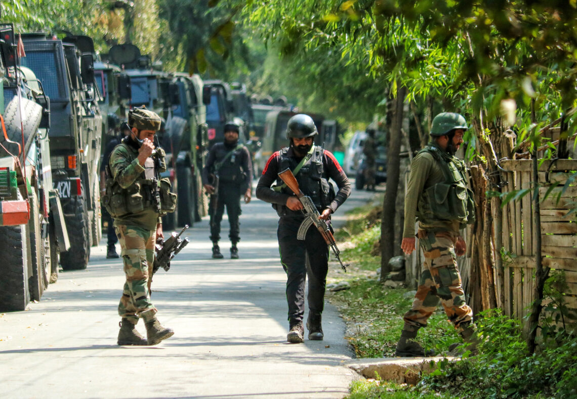 Anantnag: Security personnel taking positions during an ongoing encounter in Anantnag district on Friday, September 15, 2023. (Photo: IANS)