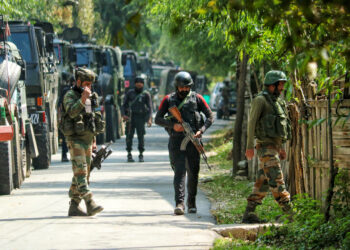 Anantnag: Security personnel taking positions during an ongoing encounter in Anantnag district on Friday, September 15, 2023. (Photo: IANS)