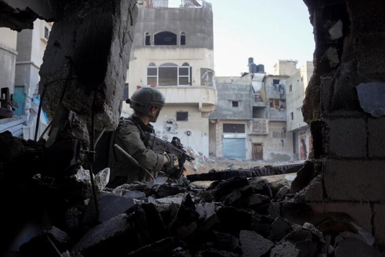 (231226) -- BEIJING, Dec. 26, 2023 (Xinhua) -- This photo released by the Israel Defense Forces (IDF) on Dec. 25, 2023 shows Israeli troops conducting military operations in the southern Gaza Strip city of Khan Younis. (Xinhua)