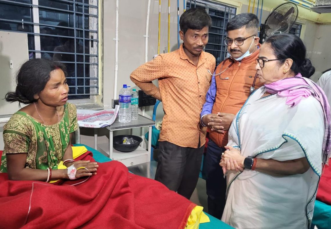 Jalpaiguri: West Bengal Chief Minister Mamata Banerjee visits people injured in a storm, at a hospital in Jalpaiguri district, Sunday night, March 31, 2024. (Photo: IANS)