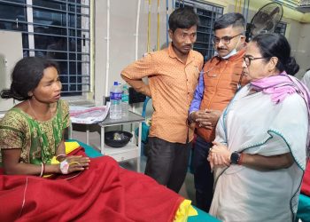 Jalpaiguri: West Bengal Chief Minister Mamata Banerjee visits people injured in a storm, at a hospital in Jalpaiguri district, Sunday night, March 31, 2024. (Photo: IANS)