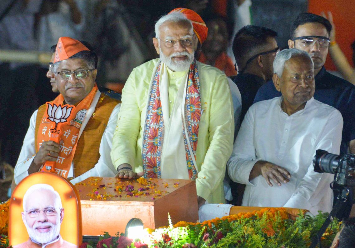 Patna: Prime Minister Narendra Modi, Bihar Chief Minister Nitish Kumar and BJP candidate from Patna Sahib constituency Ravi Shankar Prasad during an election campaign roadshow for the Lok Sabha elections, in Patna, Sunday, May 12, 2024. (Photo: IANS)