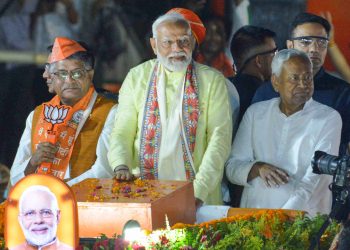 Patna: Prime Minister Narendra Modi, Bihar Chief Minister Nitish Kumar and BJP candidate from Patna Sahib constituency Ravi Shankar Prasad during an election campaign roadshow for the Lok Sabha elections, in Patna, Sunday, May 12, 2024. (Photo: IANS)