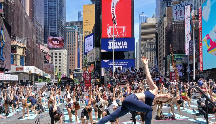 Yogis Create Island Of Stillness At New York's Frenetic Times Square ...