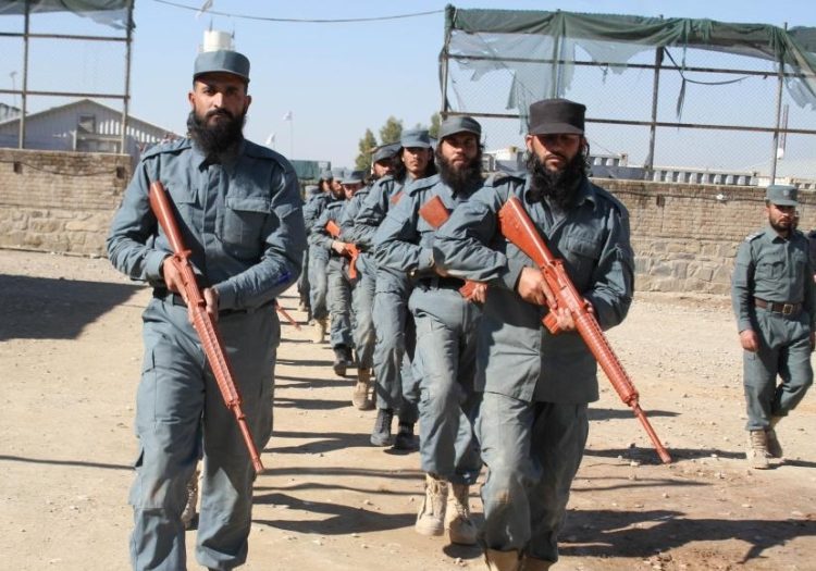 Afghan police personnel attend a graduation ceremony at a police training center in Jalalabad city, Nangarhar province, Afghanistan, Jan. 26, 2022. (Photo by Hamidullah/Xinhua/IANS)