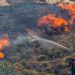 (240702) -- BEIJING, July 2, 2024 (Xinhua) -- Firefighters try to put out a fire in the forest at Keratea, southeast of Athens, Greece, June 30, 2024.
  Since the start of the wildfire season on May 1, firefighters are called to handle dozens of wildfires every day across the country. (Xinhua/Marios Lolos)