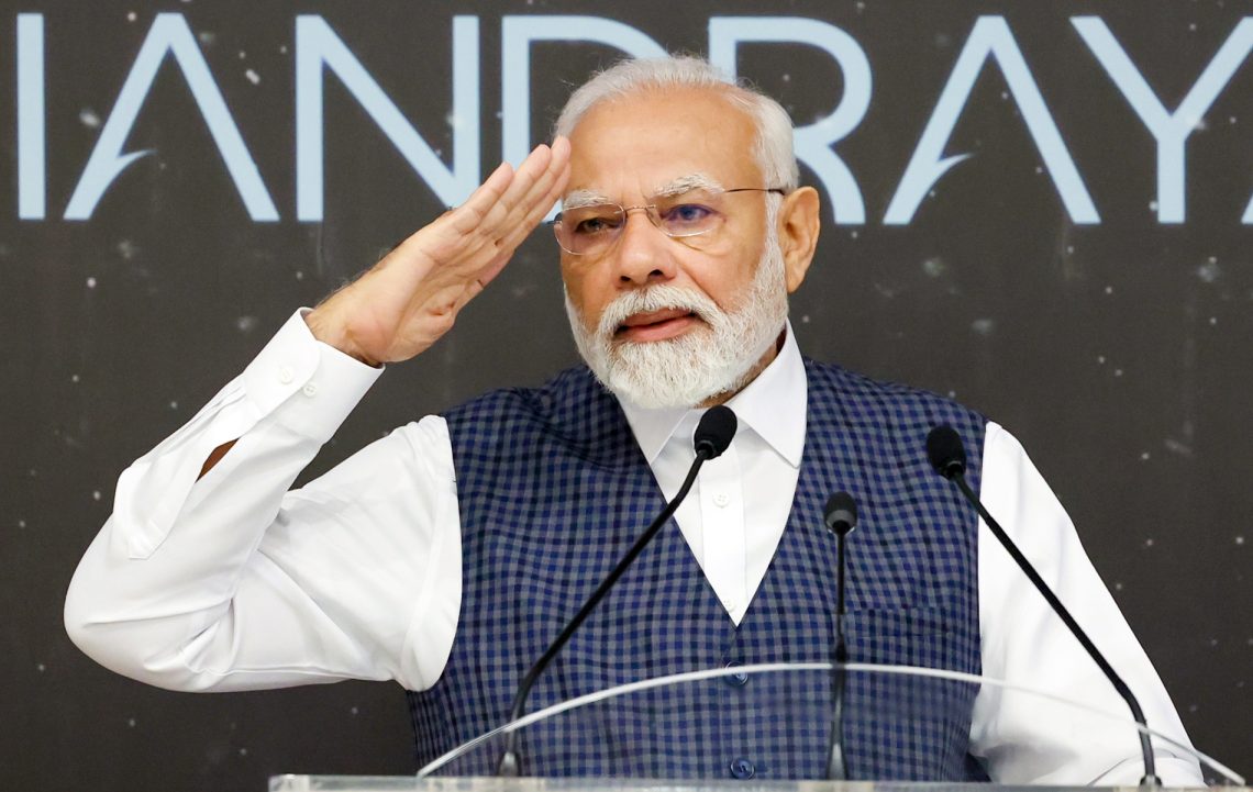 Bengaluru: Prime Minister Narendra Modi addresses during his interaction with scientists of ISRO after the  success of Chandrayaan-3 Mission, at ISRO Telemetry Tracking and Command Network (ISTRAC), in Bengaluru, Saturday, August 26, 2023. ISRO Chairman S. Somanath also seen.(IANS/PIB)