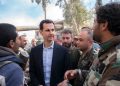 (180318) -- DAMASCUS, March 18, 2018 (Xinhua) -- Syrian President Bashar al-Assad (C) is surrounded by soldiers of Syrian army as he visits a frontline area in Damascus' Eastern Ghouta area, Syria, on March 18, 2018. Bashar al-Assad on Sunday visited a frontline area in Eastern Ghouta area, where the Syrian army is advancing against the rebels, the Syrian presidency media office said. (Xinhua/Syrian Presidency) (djj)