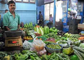 Kolkata: A vegetable vendor waits for customers at a vegetable market in Kolkata on Monday, July 03, 2023. (Photo: IANS/Kuntal Chakrabarty)