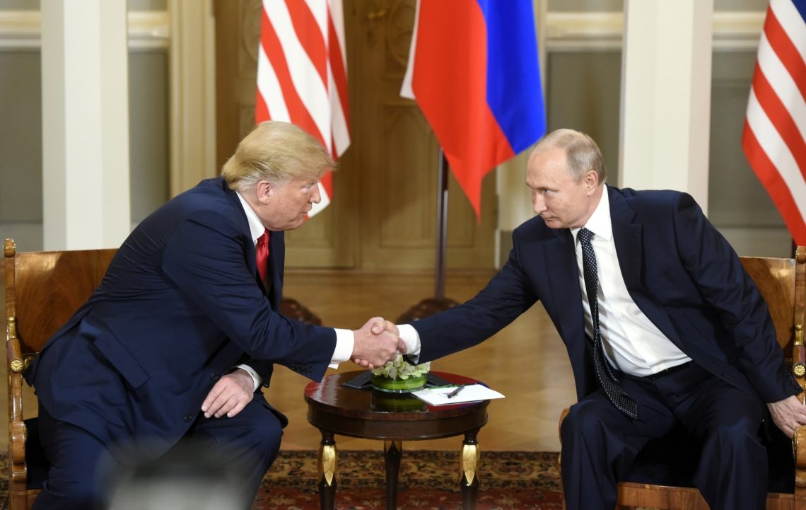 HELSINKI, July 16, 2018 (Xinhua) -- U.S. President Donald Trump (L) shakes hands with his Russian counterpart Vladimir Putin in Helsinki, Finland, on July 16, 2018. U.S. President Donald Trump and his Russian counterpart Vladimir Putin started their first bilateral meeting here on Monday, and they are expected to discuss a wide range of issues. (Xinhua/Lehtikuva/Heikki Saukkomaa/IANS)