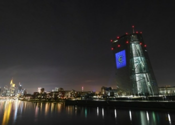 The headquarters of the European Central Bank illuminated to celebrate the 20th anniversary of Euro banknotes and coins in Frankfurt, Germany. (Xinhua/Lu Yang/IANS)