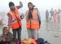 South 24 Parganas: Security personnel help the pilgrims at Sagar Island during Gangasagar Mela, in South 24 Parganas district on Monday, Jan. 15, 2024. (Photo: IANS/Kuntal Chakrabarty)