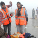 South 24 Parganas: Security personnel help the pilgrims at Sagar Island during Gangasagar Mela, in South 24 Parganas district on Monday, Jan. 15, 2024. (Photo: IANS/Kuntal Chakrabarty)