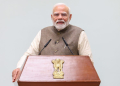 New Delhi: Prime Minister Narendra Modi addresses at the unveiling of the comprehensive collection of works by the esteemed Tamil poet and freedom fighter Subramania Bharati at his residence, 7 Lok Kalyan Marg in New Delhi on Wednesday, December 11, 2024. (Photo: IANS)