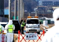 Seoul :his file photo taken Feb. 8, 2022, shows officials carrying out a disinfection operation on a road in the city of Pyeongtaek, Gyeonggi Province, after a farm in the city reported a highly pathogenic avian influenza case.(Yonhap/IANS)