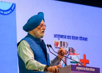 New Delhi: Union Petroleum Minister Hardeep Puri speaks during the Ayushman Vay Vandana Yojana distribution program at Thyagraj Stadium in New Delhi, Monday, April 28, 2025 (Photo: IANS/Prem Nath Pandey)