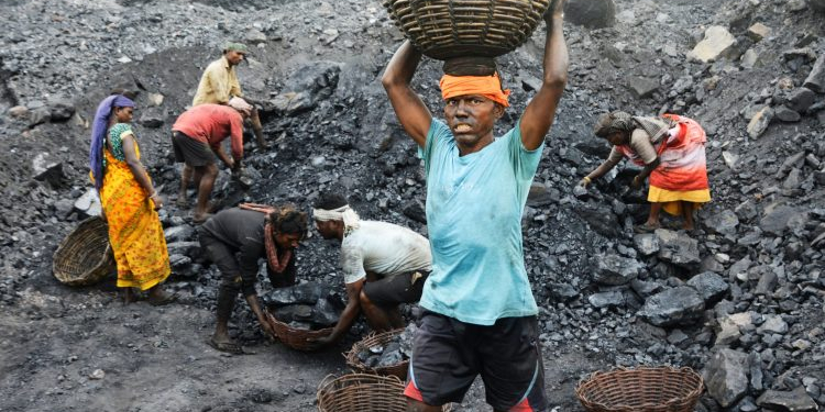 Dhanbad: Coal workers at work on the eve of Labour Day, in Dhanbad, Wednesday, April 30, 2025. (Photo: IANS)