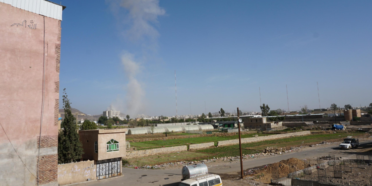 SANAA, May 16, 2019 (Xinhua) -- Smoke rises after an airstrike hit by the Saudi Arabia-led coalition in Sanaa, capital of Yemen, on May 16, 2019. The Saudi Arabia-led coalition launched airstrikes on Houthi rebels' targets in the Yemeni capital Sanaa on Thursday morning, causing civilian casualties and damages, authorities and local residents said. At least six family members were killed when a coalition airstrike hit a house in the center of Sanaa, the rebel-controlled Health Ministry said in a statement. (Xinhua/Mohamed al-Azaki/IANS)