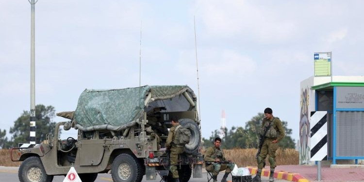Israeli soldiers block a road near Sderot in southern Israel near the border with Gaza, on May 9, 2023. ((Ilan Assayag/JINI via Xinhua/IANS)