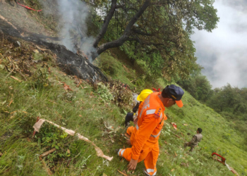 Rudraprayag: Rescue operation underway after a helicopter crashed near Jorsi, en route from Shri Kedarnath Dham to Guptkashi, in the early hours of Sunday, June 15, 2025. (Photo: IANS)