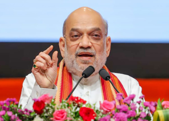 Gandhinagar: Union Home and Cooperation Minister Amit Shah lights a ceremonial lamp during the fifth All India Official Language Conference on Hindi Diwas, at Mahatma Mandir in Gandhinagar on Sunday, September 14, 2025. Gujarat Chief Minister Bhupendra Patel is also present. (Photo: IANS/X/@Bhupendrapbjp)