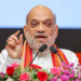 Gandhinagar: Union Home and Cooperation Minister Amit Shah lights a ceremonial lamp during the fifth All India Official Language Conference on Hindi Diwas, at Mahatma Mandir in Gandhinagar on Sunday, September 14, 2025. Gujarat Chief Minister Bhupendra Patel is also present. (Photo: IANS/X/@Bhupendrapbjp)