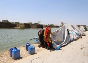 Flood-affected people set up a makeshift tent in flood-hit Dadu district in Pakistan's Sindh province on Aug. 31, 2022. (Str/Xinhua/IANS)