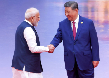 Tianjin: Prime Minister Narendra Modi shakes hands with Chinese President Xi Jinping as they attend a ceremony to welcome Heads of States of the SCO (Shanghai Cooperation Organisation), in Tianjin, China, Sunday, August 31, 2025. (IANS/PMO)
