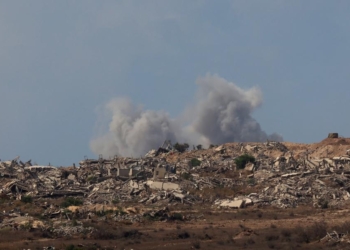 (251001) -- JERUSALEM, Oct. 1, 2025 (Xinhua) -- This photo taken on Sept. 30, 2025 shows smoke rising following an attack in Gaza City as seen from Israel. (Photo by Gil Cohen Magen/Xinhua)