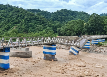 Kurseong: A view of the collapsed Dudia Iron Bridge connecting Mirik and Kurseong in Darjeeling district, West Bengal, on Sunday, October 5, 2025. The collapse, triggered by heavy rainfall and subsequent landslides, has severed vital road links in the region. (Photo: IANS)