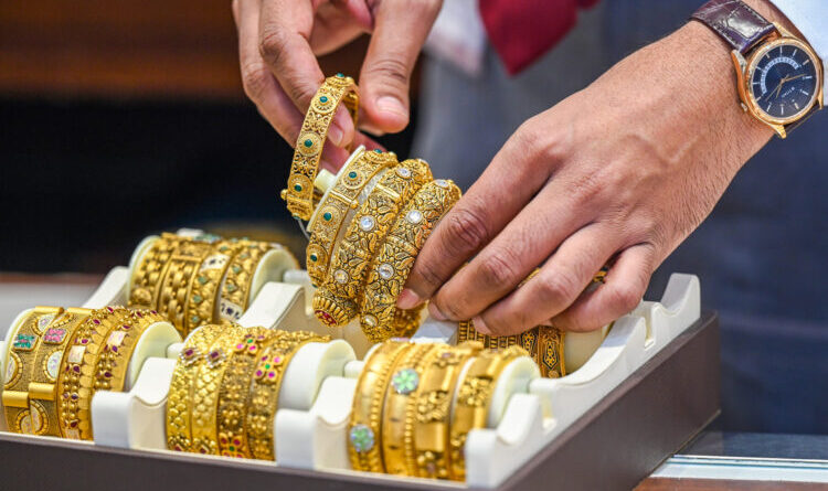 Noida: Women buy gold jewellery on Dhanteras at Joyalukkas Jewellers in Sector 18, in Noida on Saturday, October 18, 2025. (Photo: IANS)