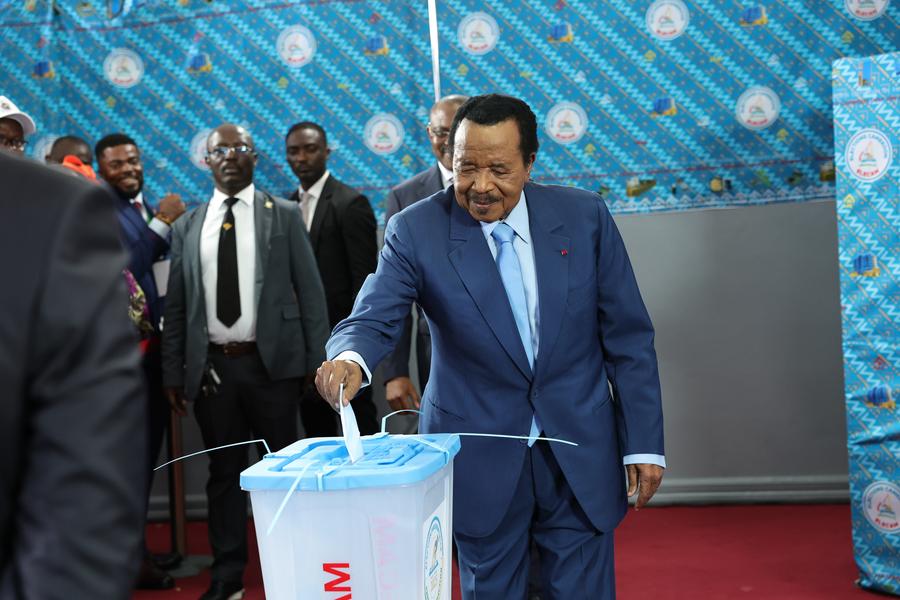 (251027) -- YAOUNDE, Oct. 27, 2025 (Xinhua) -- Paul Biya, president of Cameroon and candidate of the Cameroon People's Democratic Movement, casts his ballot at a polling station in Yaounde, capital of Cameroon, Oct. 12, 2025. Biya has been re-elected president of Cameroon for an eighth term, securing 53.66 percent of the votes, the country's Constitutional Council announced Monday. (Photo by Kepseu/Xinhua)