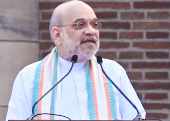 New Delhi: Union Home Minister Amit Shah addresses during the flagging off of the Run for Unity dedicated to Sardar Vallabhbhai Patel on the occasion of Rashtriya Ekta Diwas at Major Dhyan Chand National Stadium in New Delhi on Friday, October 31, 2025. (Photo: IANS)