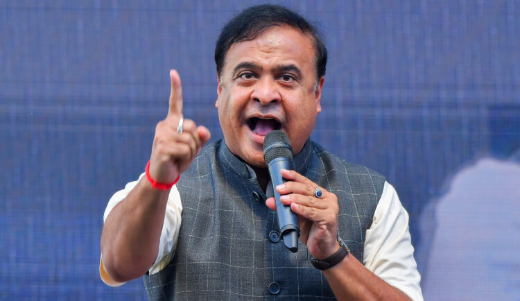 Nagaon: Assam Chief Minister Himanta Biswa Sarma addresses the gathering before presenting cheques to women beneficiaries under the Mahila Udyamita Abhijan at Nehrubali Field, Nagaon, Wednesday, October 22, 2025. (Photo: IANS)