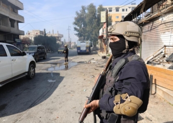 (250310) -- JABLEH, March 10, 2025 (Xinhua) -- Members of the Syrian security forces stand guard on a street in the coastal city of Jableh, Latakia province, northwestern Syria, March 9, 2025. Syrian interim President Ahmed al-Sharaa on Sunday announced the formation of a High Committee for Civil Peace, tasked with engaging directly with communities in the coastal region to address concerns and ensure stability. (Str/Xinhua)