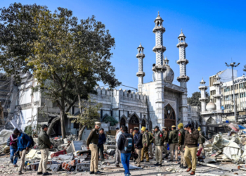 New Delhi: Police personnel present at the spot during a demolition drive near the Faiz-e-Elahi Masjid at Turkman Gate, in New Delhi on Thursday, January 9, 2025. (Photo: IANS/Deepak Kumar)
