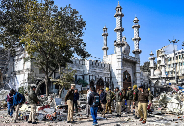 New Delhi: Police personnel present at the spot during a demolition drive near the Faiz-e-Elahi Masjid at Turkman Gate, in New Delhi on Thursday, January 9, 2025. (Photo: IANS/Deepak Kumar)