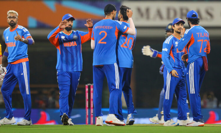 Chennai: India's Axar Patel celebrates with teammates after the dismissal of Zimbabwe's Tadiwanashe Marumani during the ICC Men's T20 World Cup 2026 Super 8 Group 1 match between India and Zimbabwe at the MA Chidambaram Stadium in Chennai, Thursday, February 26, 2026. (IANS)