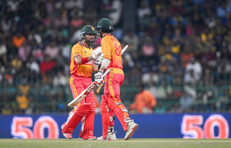 Colombo: Zimbabwe's Brian Bennett celebrates with captain Sikandar Raza after scoring fifty runs during the Group B ICC Men's T20 World Cup 2026 match between Sri Lanka and Zimbabwe at R. Premadasa Stadium in Colombo on Thursday, February 19, 2026. (Photo: IANS/Biplab Banerjee)